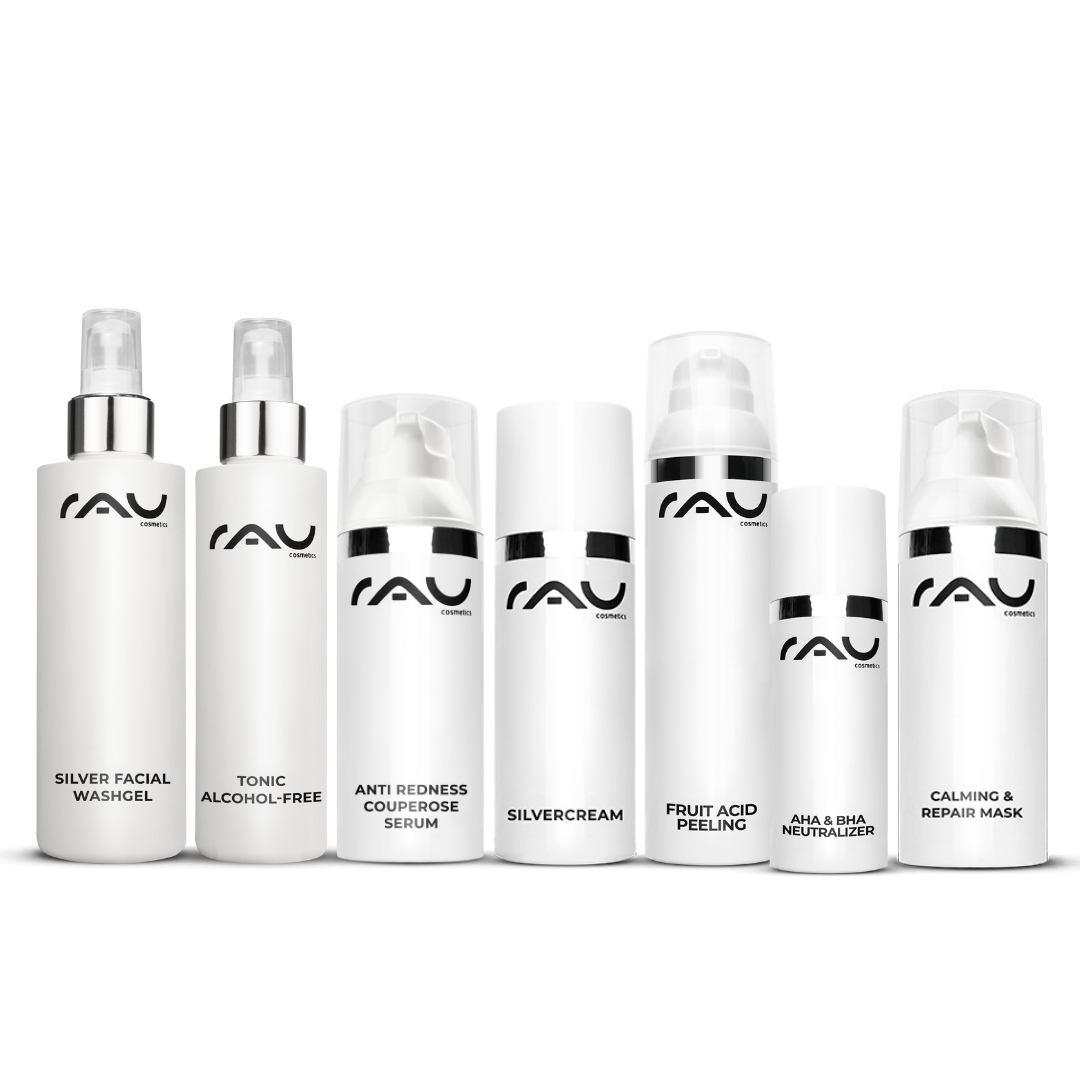 Professional care routine for couperose Profi Pflegeroutine für Couperose von RAU Cosmetics, bestehend aus sieben Produkten: Silber Waschgel, alkoholfreies Tonic, Anti-Rötungen Serum, Silvercream, Fruchtsäurepeeling, AHA & BHA Neutralizer und beruhigende Pflege Maske, auf weißem Hintergrund.