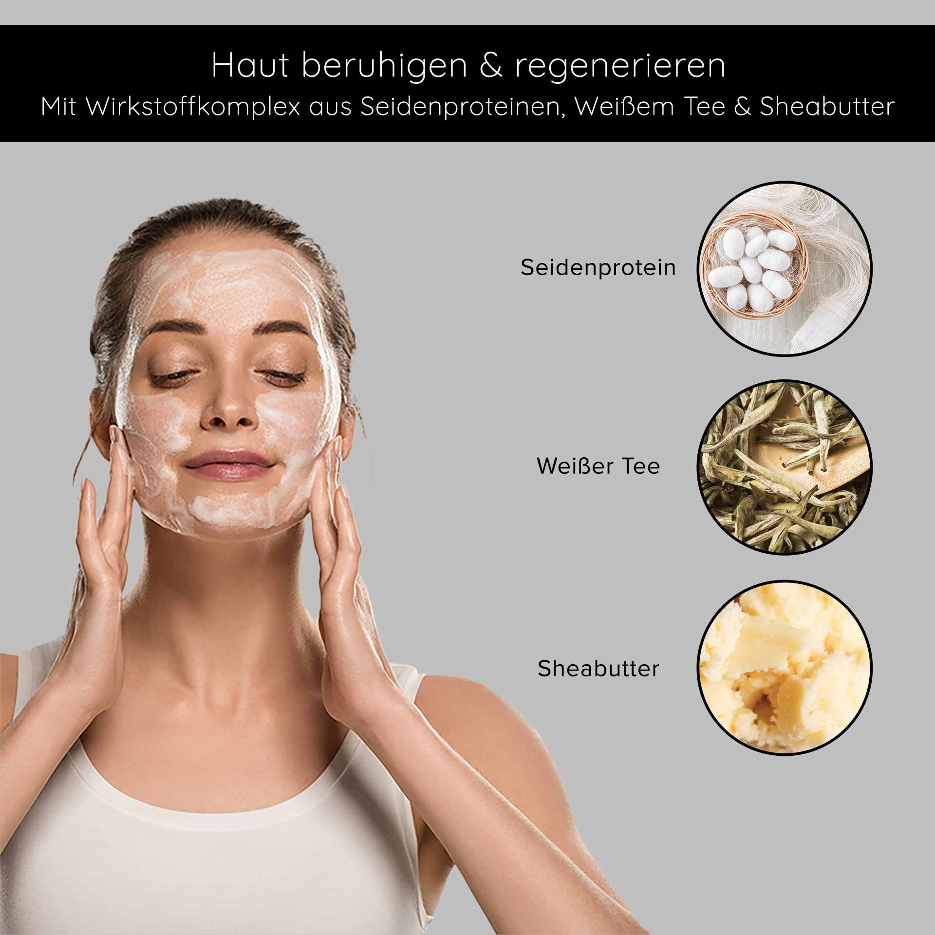 Frau mit schäumender Gesichtsmaske, die Seidenproteine, weißen Tee und Sheabutter zur Hautberuhigung und -regeneration anwendet.