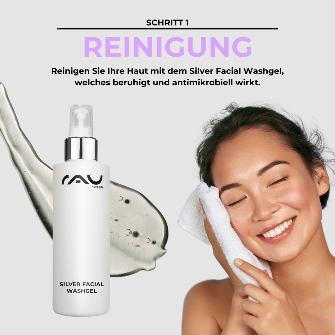 Frau mit lächelndem Gesicht reinigt ihre Haut mit einem Handtuch, während sie das Silver Facial Washgel von RAU Cosmetics anwendet, Schritt 1 der Hautpflegeroutine.