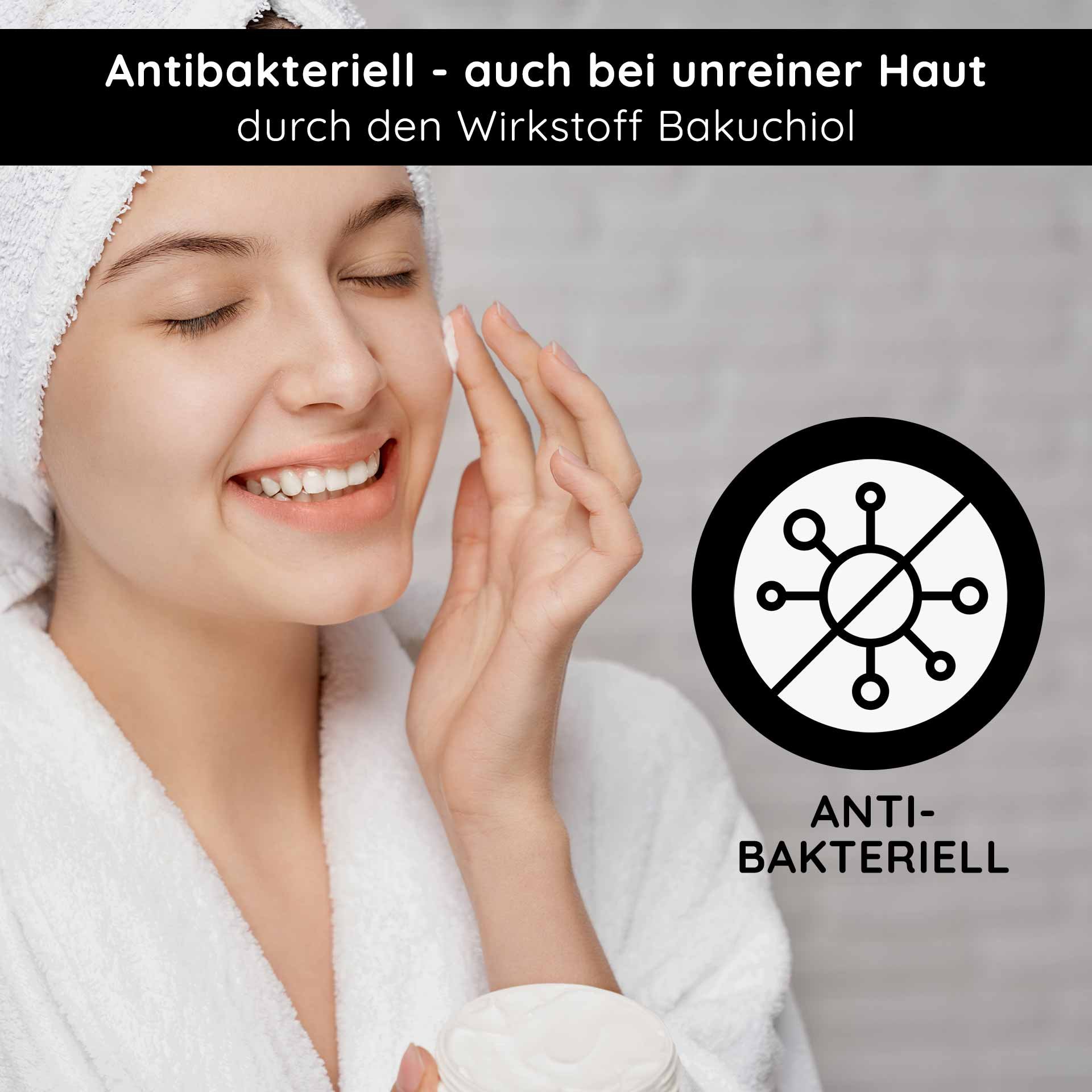 Antibacterial effect: A smiling woman during her evening routine uses the clarifying properties of Bakuchiol.